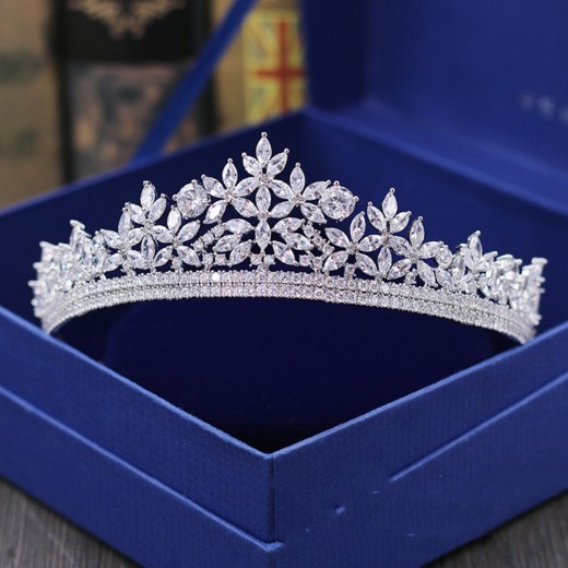 Shop for a Bridal Wedding Crown – perfect for your special day or dinner events. Elegant hair accessories featuring crystals, pearls, and luxurious designs for the modern bride.