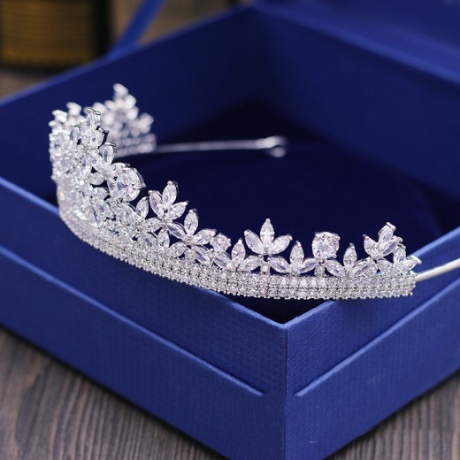 Shop for a Bridal Wedding Crown – perfect for your special day or dinner events. Elegant hair accessories featuring crystals, pearls, and luxurious designs for the modern bride.