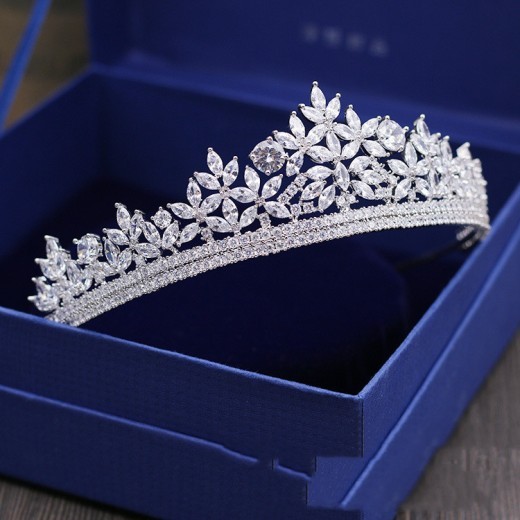 Shop for a Bridal Wedding Crown – perfect for your special day or dinner events. Elegant hair accessories featuring crystals, pearls, and luxurious designs for the modern bride.