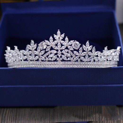 Shop for a Bridal Wedding Crown – perfect for your special day or dinner events. Elegant hair accessories featuring crystals, pearls, and luxurious designs for the modern bride.