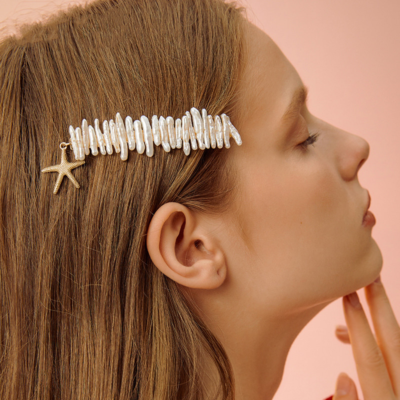 Add a charming touch to your hairstyle with the Pearl Starfish Hairpin One Word Clip. Elegant and stylish, perfect for special occasions and everyday wear in New Zealand.