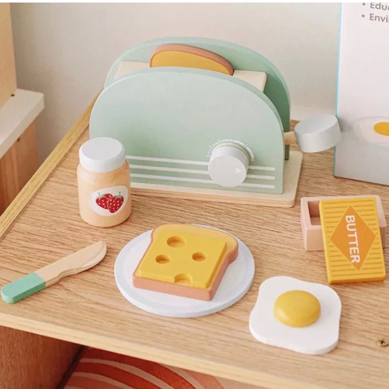 "My Little Bread Maker – Wooden Toy Pretend Play for Kids. Safe, durable, and fun, this eco-friendly wooden toy set helps children develop motor skills and creativity through role-playing baking fun.