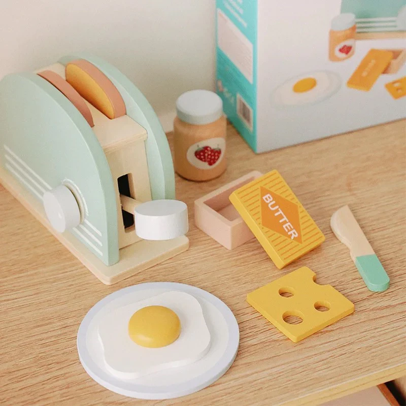 "My Little Bread Maker – Wooden Toy Pretend Play for Kids. Safe, durable, and fun, this eco-friendly wooden toy set helps children develop motor skills and creativity through role-playing baking fun.
