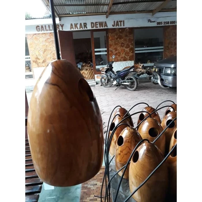 Add natural elegance to your home with a handcrafted Teak Wood Lamp Decoration. Made from sustainably sourced teak, this eco-friendly lamp provides warm, ambient light for any room. Ideal for New Zealand homes.
