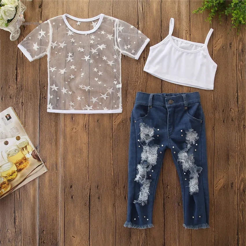Conjunto de 2 piezas de camiseta de manga corta con estampado de estrellas para niñas pequeñas, pantalones vaqueros con agujeros y vaqueros perlados