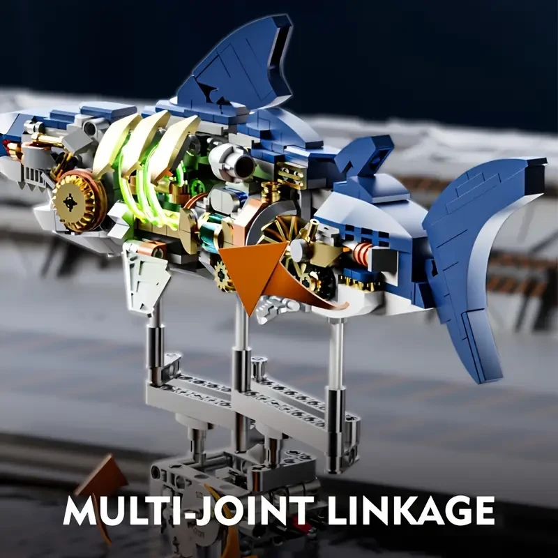 Kit de construcción de tiburón azul Marine Explorer de 687 piezas con iluminación y soporte de exhibición, material ABS, mecanismo de articulación múltiple, juguete educativo STEM para entusiastas del mar.