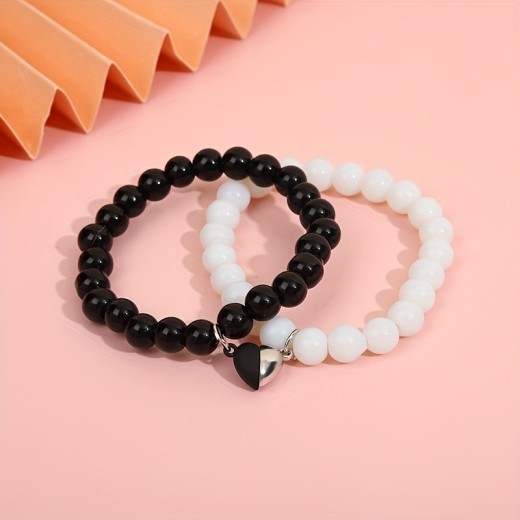 Nueva pulsera de moda con ventosa de amor en blanco y negro