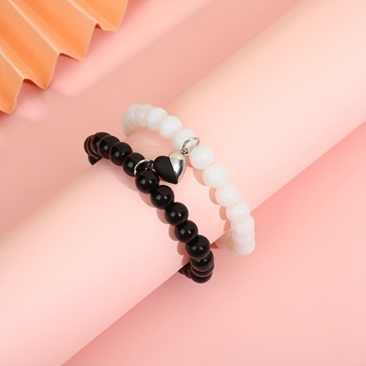 Nueva pulsera de moda con ventosa de amor en blanco y negro