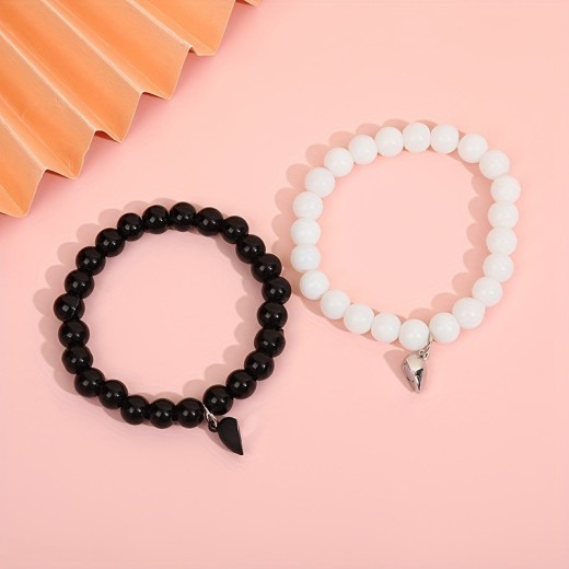 Nueva pulsera de moda con ventosa de amor en blanco y negro