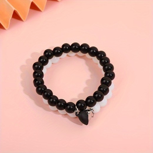 Nueva pulsera de moda con ventosa de amor en blanco y negro