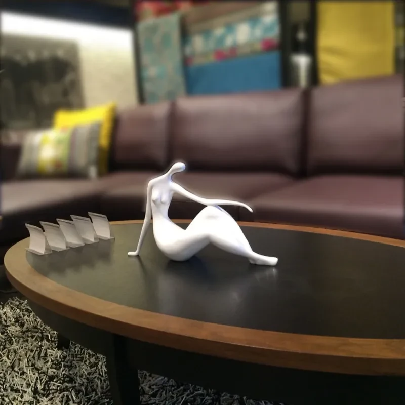 Adornos de personajes para accesorios creativos y abstractos para el hogar.