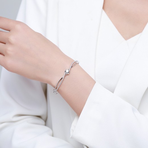 Pulsera de plata con corazón cruzado de doble capa para mujer