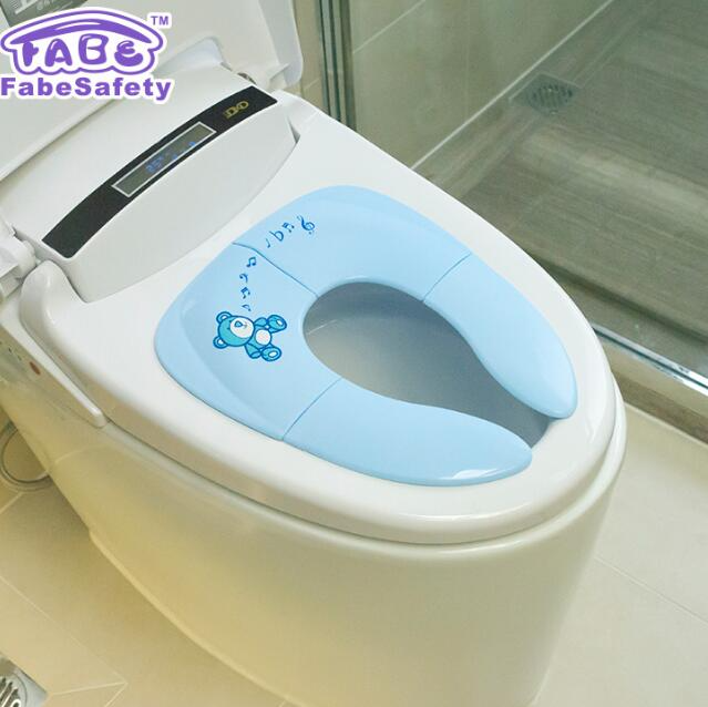 Asiento de inodoro plegable para niños