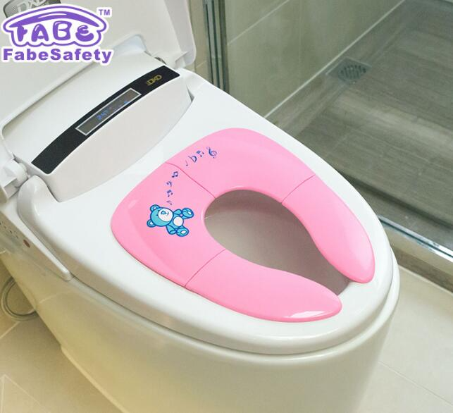 Asiento de inodoro plegable para niños