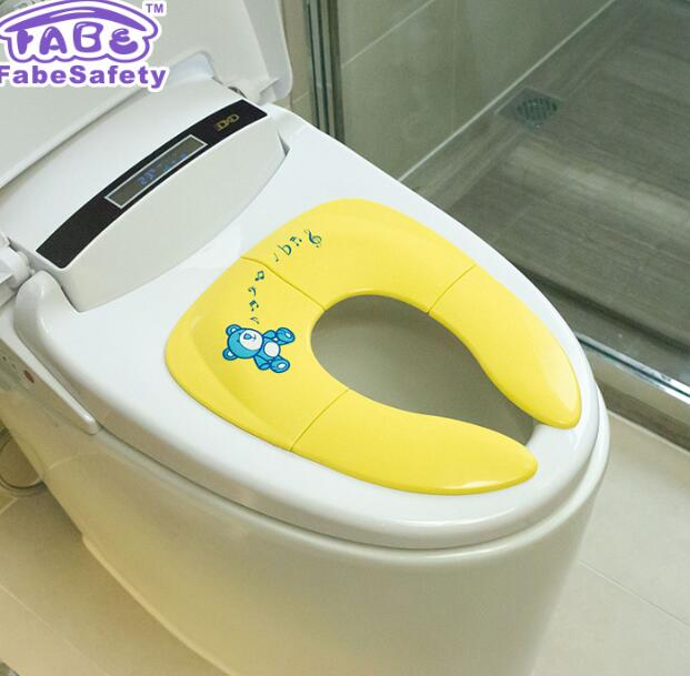 Asiento de inodoro plegable para niños
