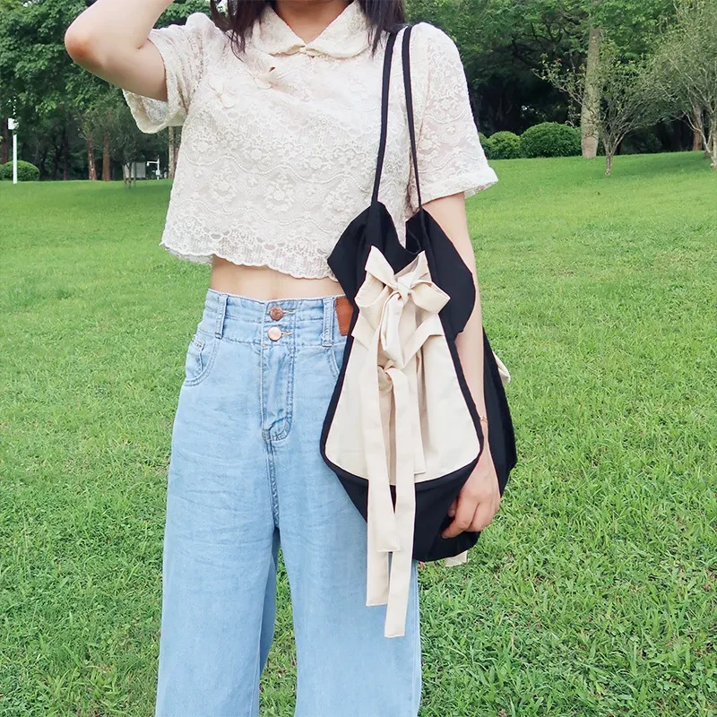 Bolso de tela nuevo de diseño de interés especial, bolso de hombro portátil de estilo Mori de gran capacidad