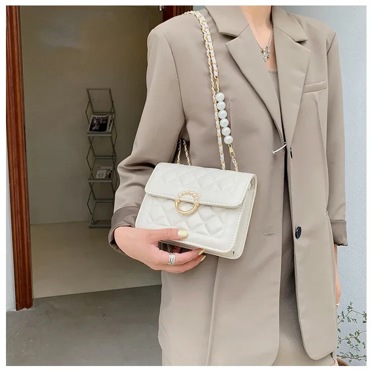 Bolso bandolera con cadena de diamantes