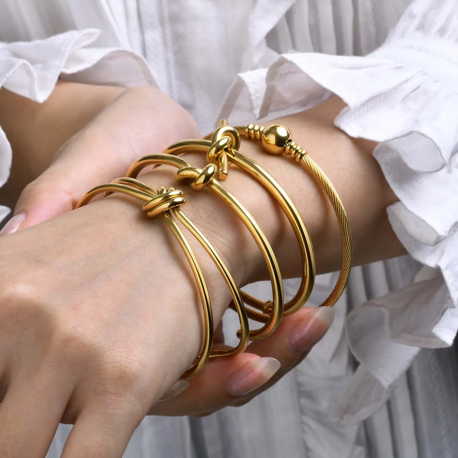 Pulsera de moda de nudo abierto de acero inoxidable para mujer