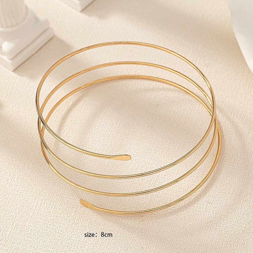 Brazalete ajustable vintage de metal dorado en capas