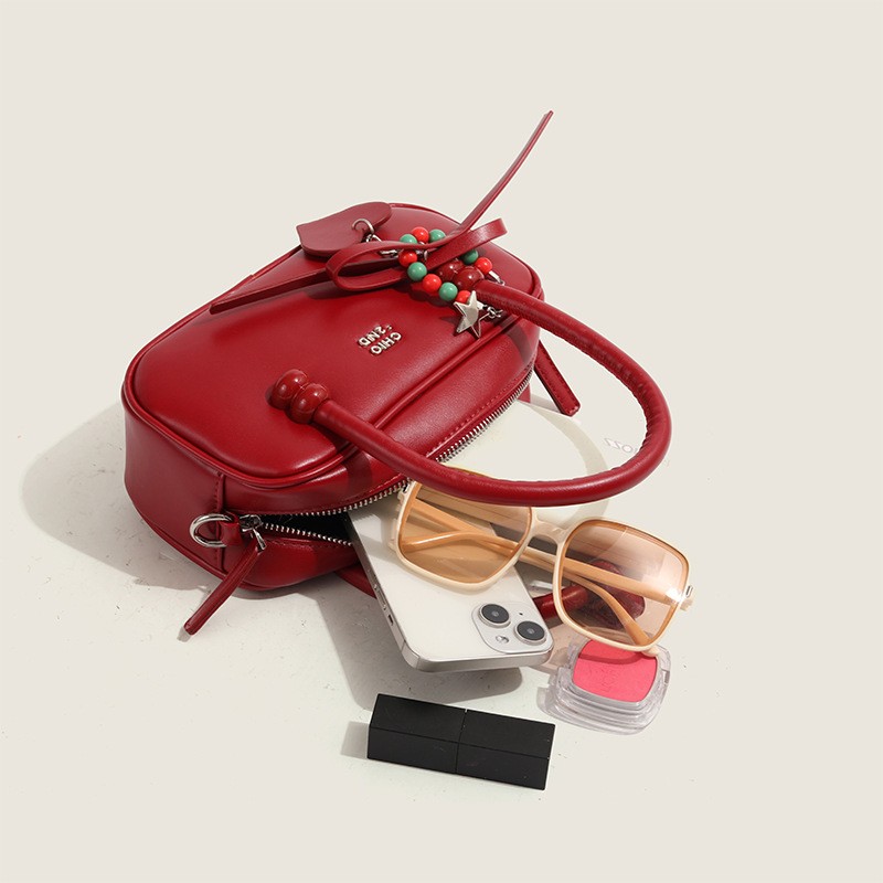 Bolso bandolera portátil con diseño de cuadros rojos
