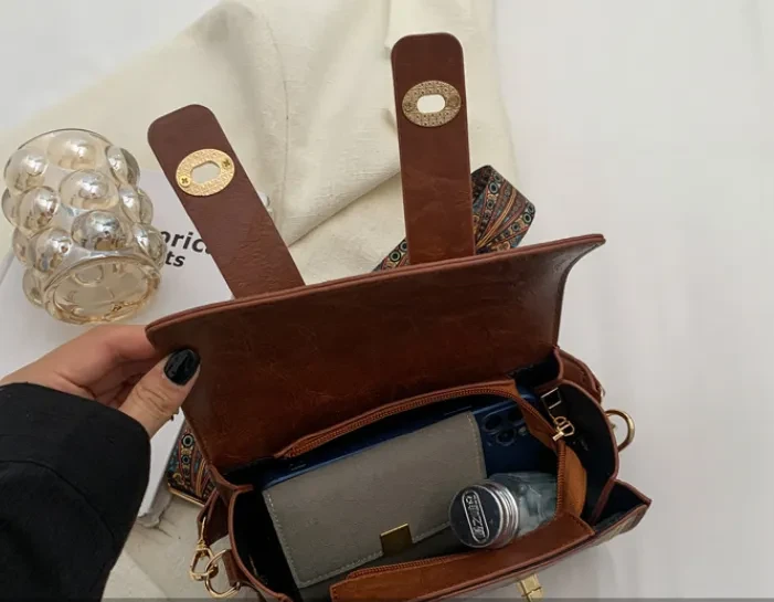 Bolso bandolera portátil de moda versátil