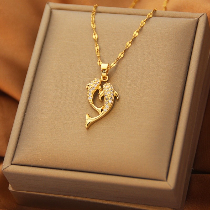 Exquisito collar con colgante de delfín de acero de titanio