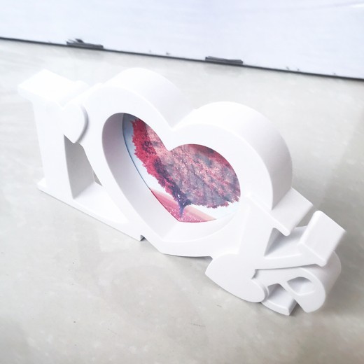 Marco de fotos con combinación de amor simple y creativo para estudio fotográfico