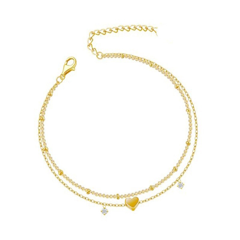 Delicada pulsera de corazón chapada en oro de 14 quilates