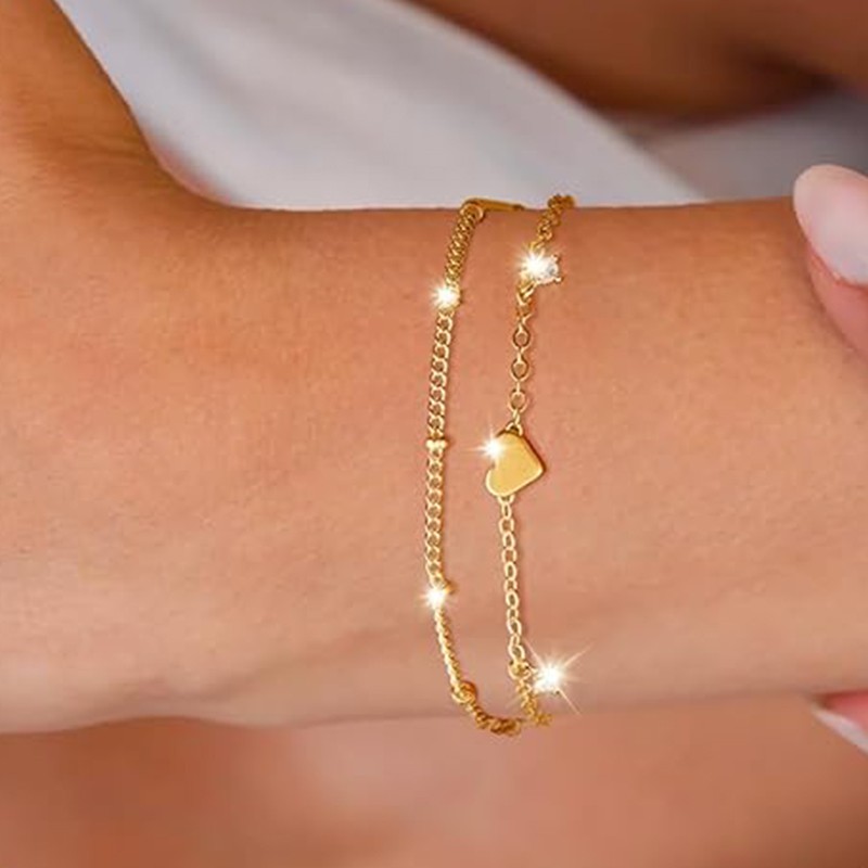 Delicada pulsera de corazón chapada en oro de 14 quilates
