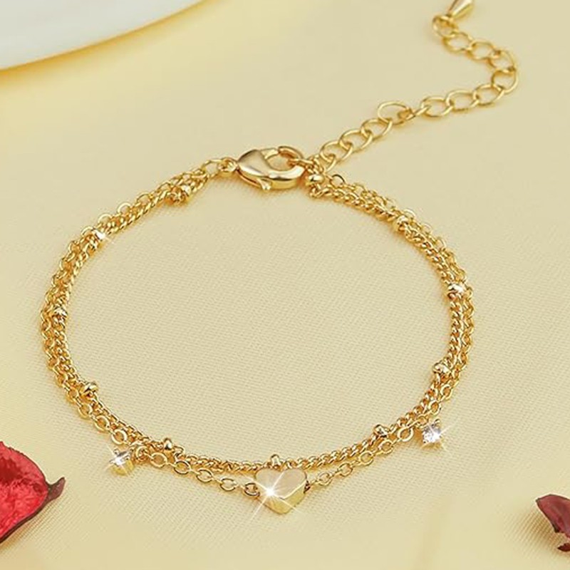 Delicada pulsera de corazón chapada en oro de 14 quilates