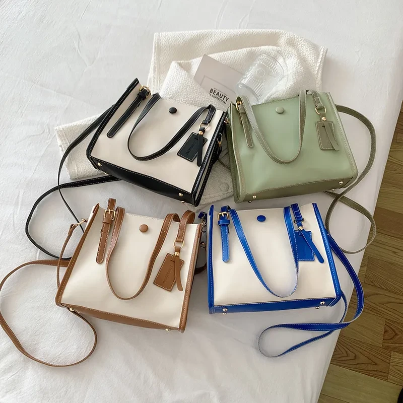 Bolso bandolera popular con costuras de moda