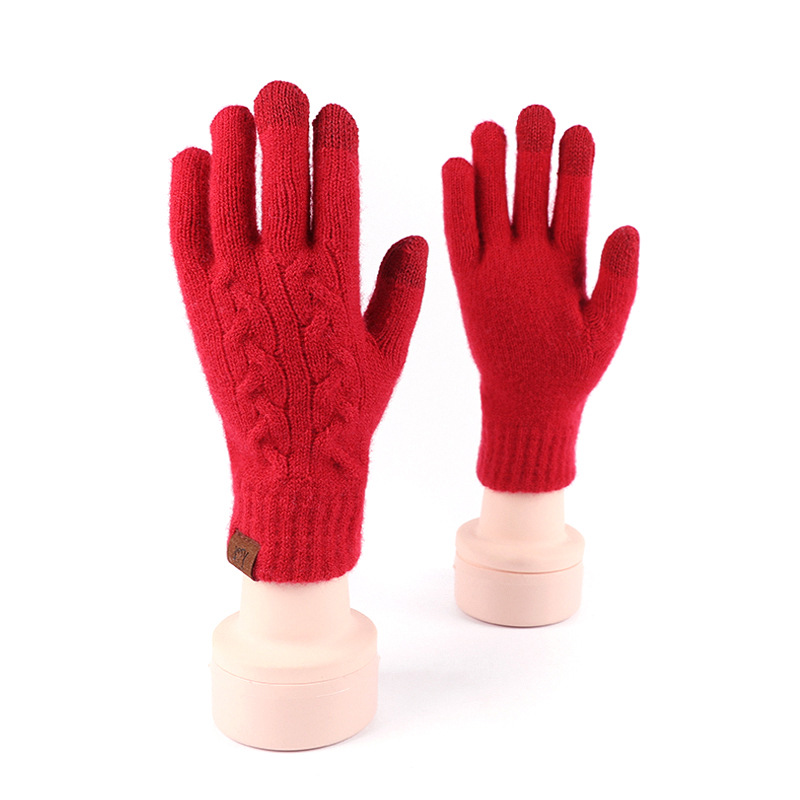 Guantes rojos festivos de Año Nuevo