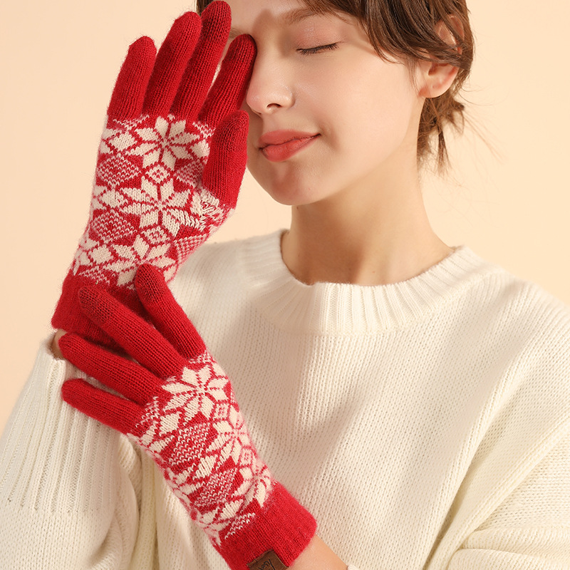 Guantes rojos festivos de Año Nuevo