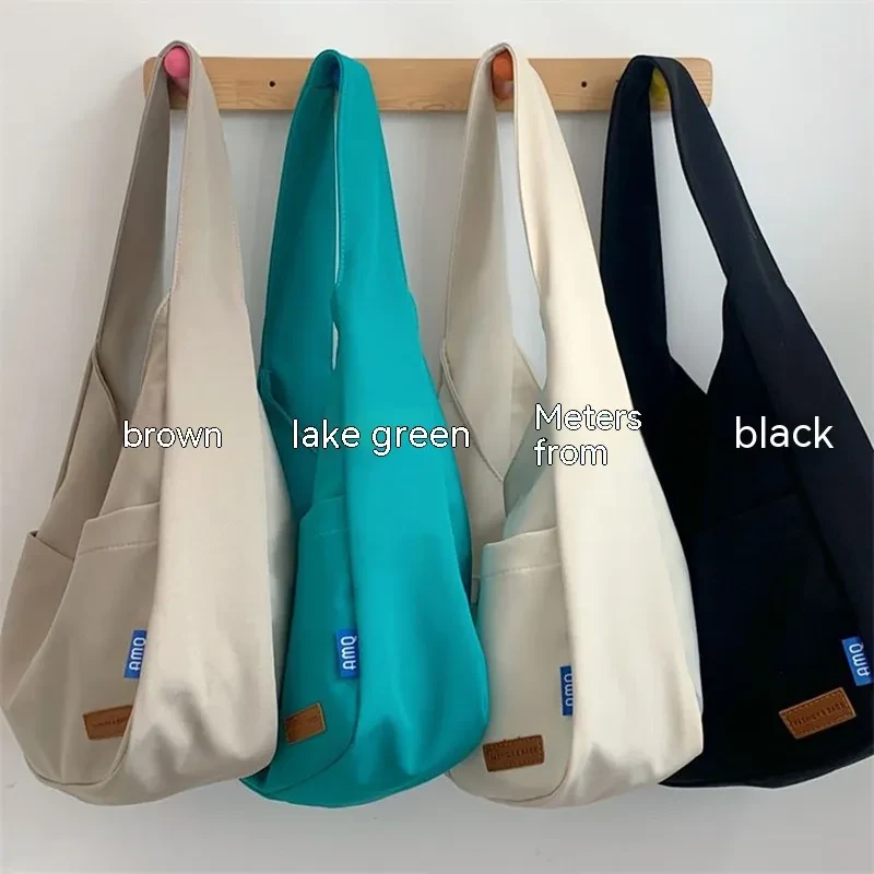 Bolso bandolera de lona con bordado informal de moda