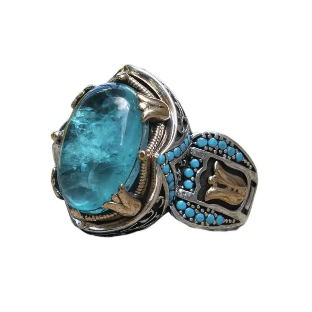 Anillo con gema ovalada azul de estilo retro