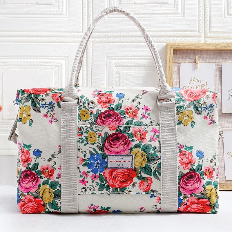 Bolsa de viaje ligera y de gran capacidad, portátil, con asa y cubierta.