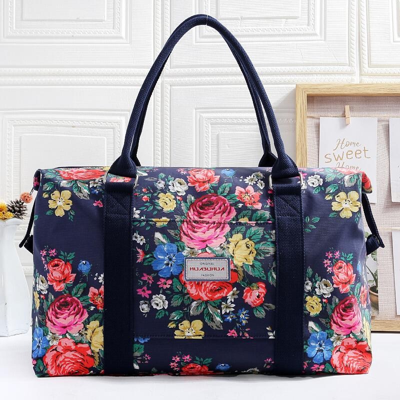 Bolsa de viaje ligera y de gran capacidad, portátil, con asa y cubierta.