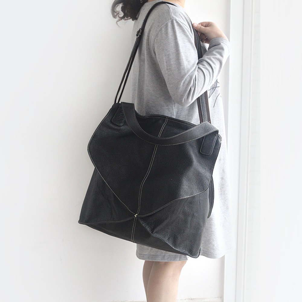 Bolso de mano de primera capa de piel de vaca con costuras