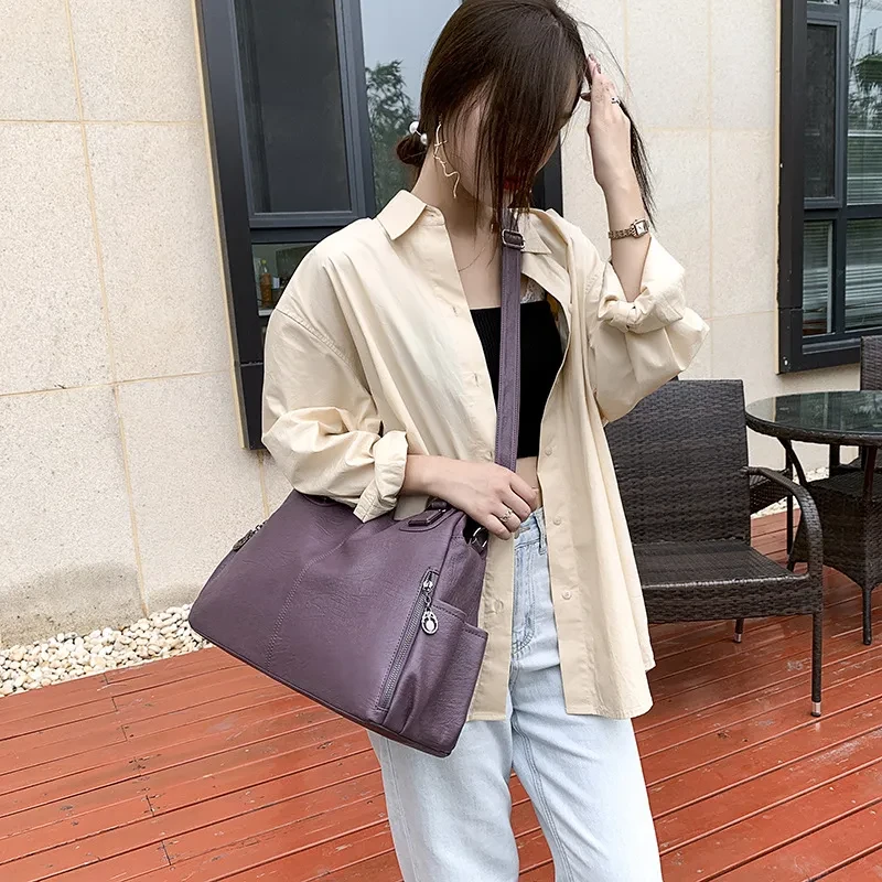 Bolso bandolera de piel suave de gran capacidad para mujer, moderno y combinable.