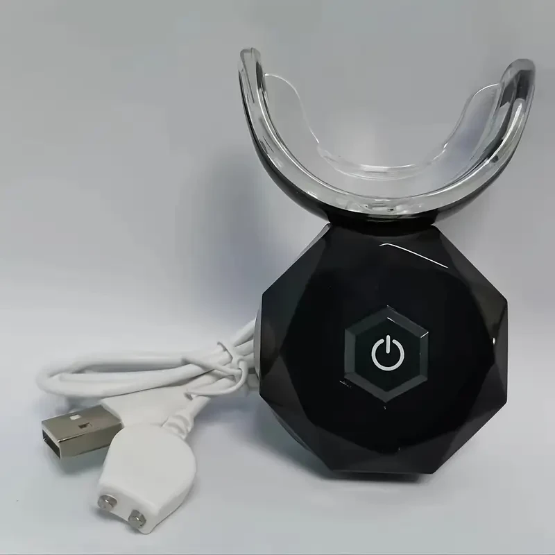 Dispositivo de blanqueamiento dental LED recargable por USB.