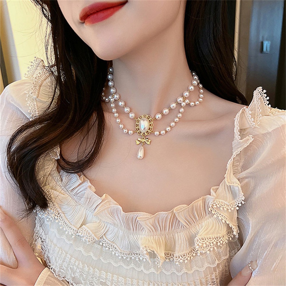 Elegante collar de corazón de perla blanca