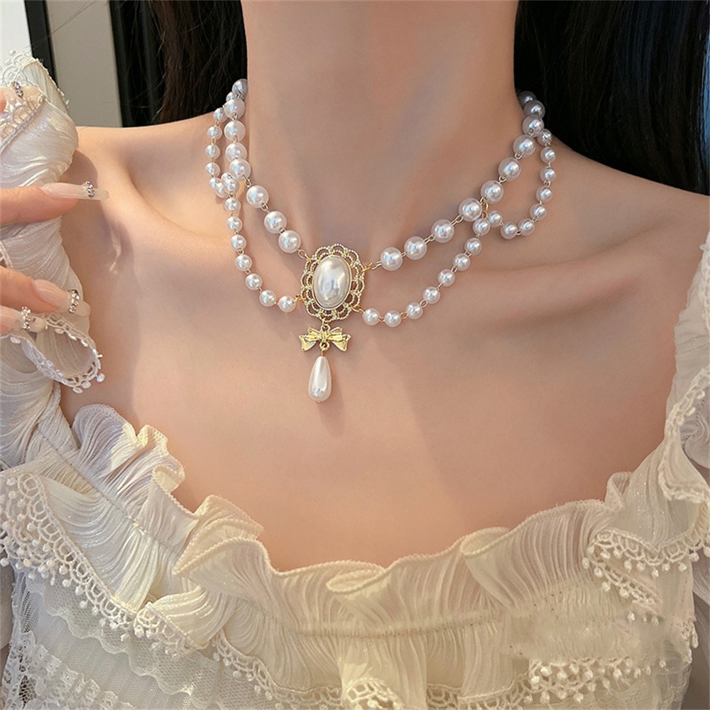 Elegante collar de corazón de perla blanca