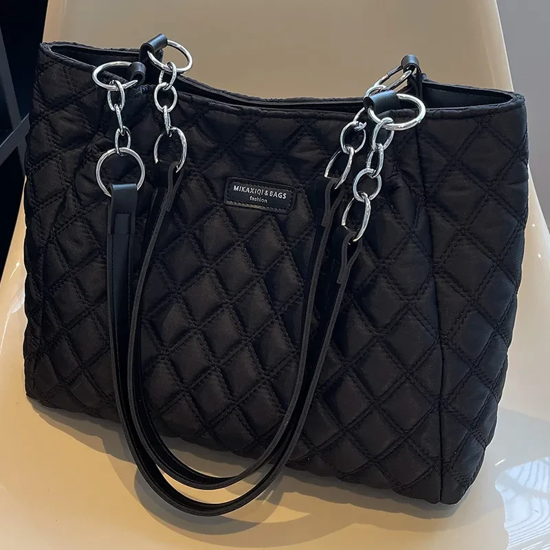 Bolso tote de lona de un solo hombro con textura avanzada