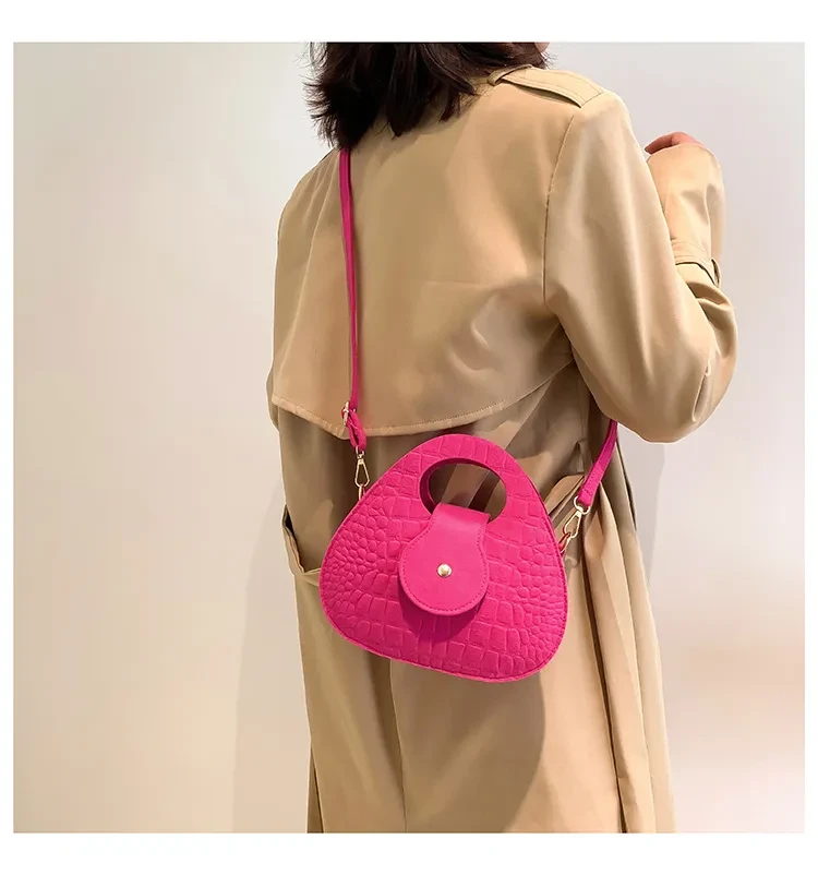 Bolso bandolera pequeño y redondo para el día a día, sencillo y portátil.
