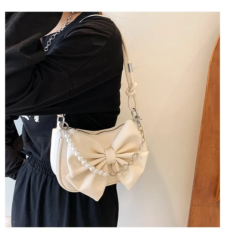 Bolso de hombro Niche con textura cruzada y lazo de cadena