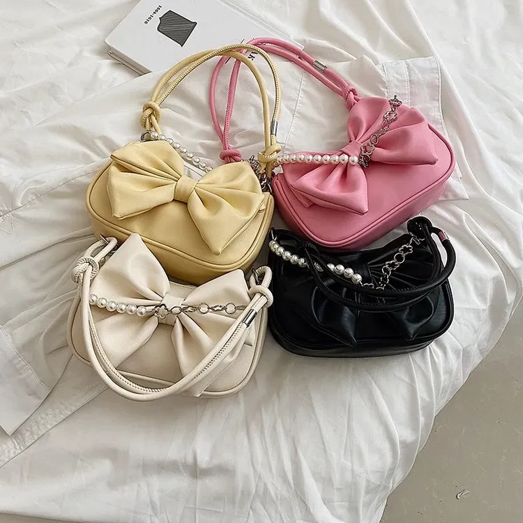 Bolso de hombro Niche con textura cruzada y lazo de cadena