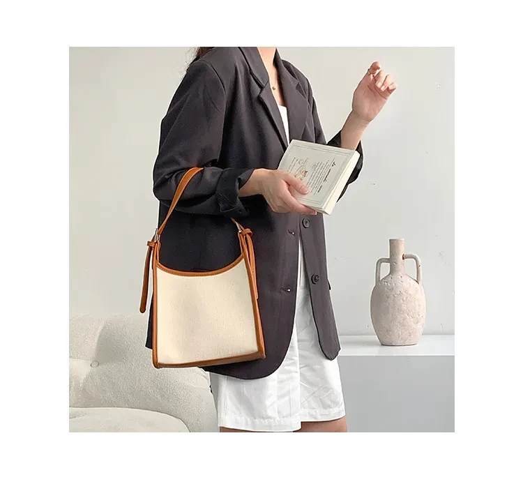 Bolso de hombro con costuras para mujer, nuevo bolso de verano a la moda, combinable con todo, de alta calidad, para llevar debajo del brazo.