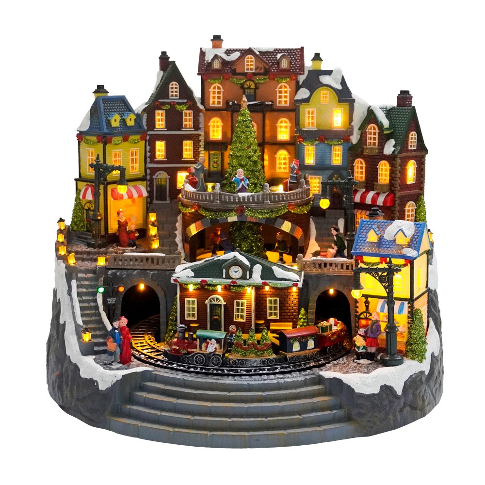 Gran casa musical LED luminosa con tren giratorio y adornos navideños giratorios.
