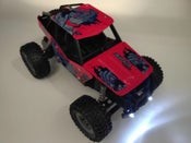 Coche de carreras de montaña con control remoto recargable de 2,4 GHz, 15 km/h con luz