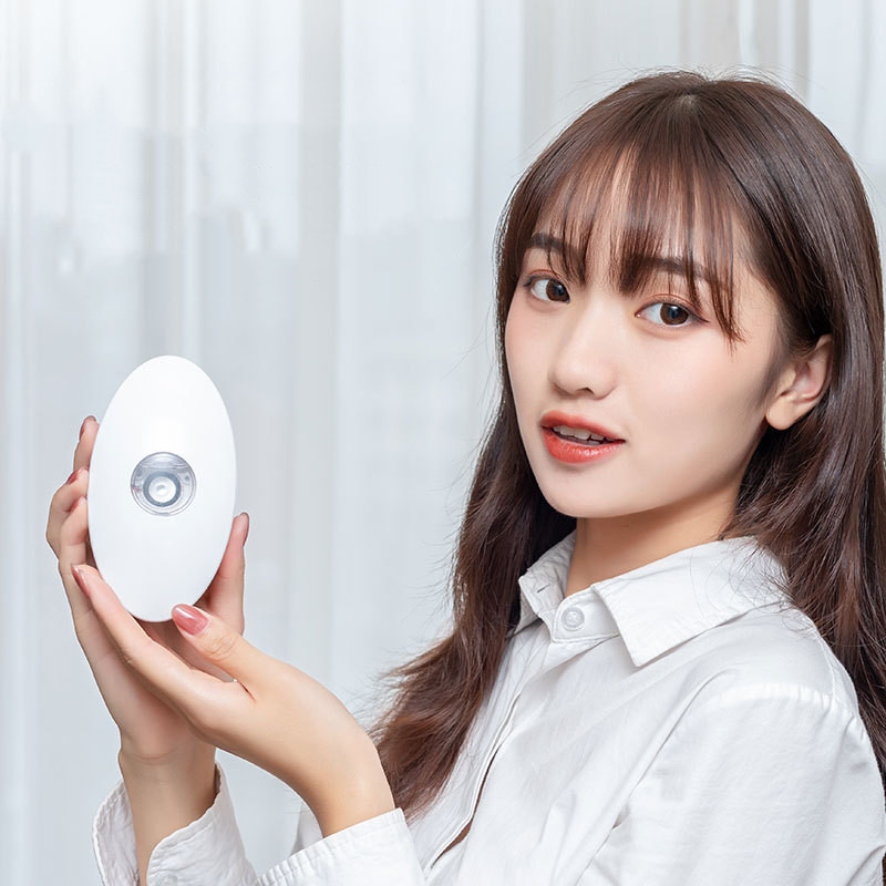 Peine de peluquería portátil con vibración eléctrica y pulverizador iónico